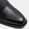 Elegante mocasín con hebilla